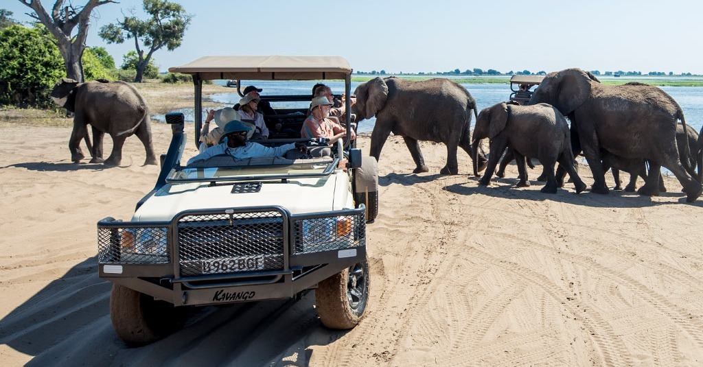 2-Africa-Botswana-Chobe-National-Park-River-Elephants-Guests-Vehicle